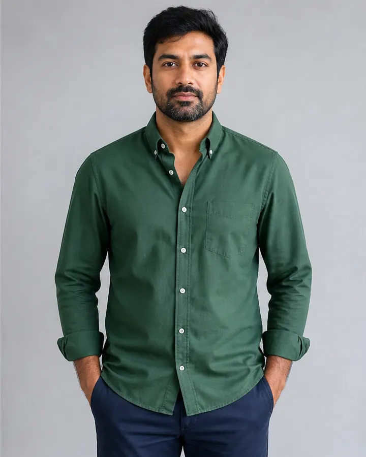 Same man wearing a forest-green Oxford shirt after AI virtual shirt try-on