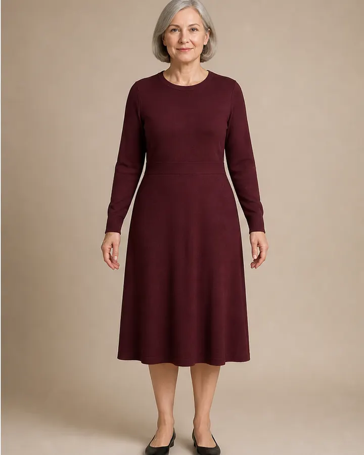 Same woman wearing a burgundy knit dress in an AI preview that does not determine clothing size