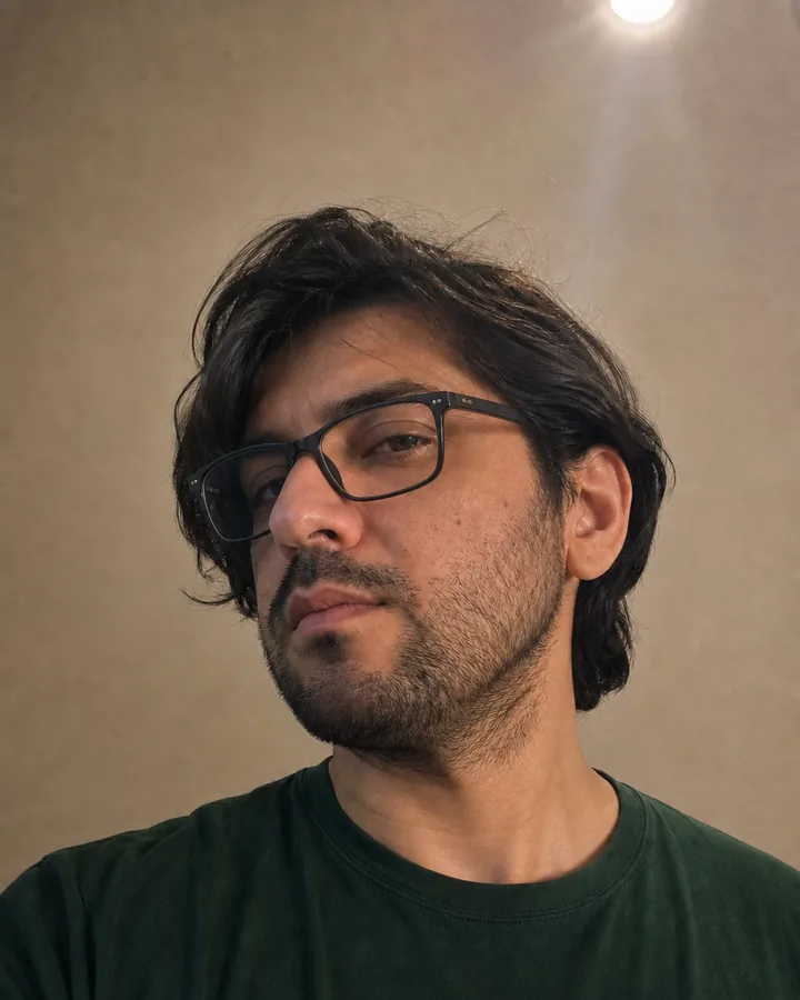 Same angled man wearing black rectangular glasses with unequal lens perspective after AI try-on